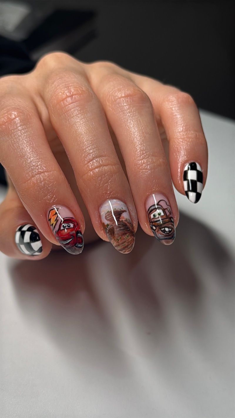 Almond nails with checkerboard, racing car and brown swirl art