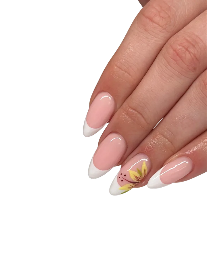 White French tips with a delicate yellow flower accent